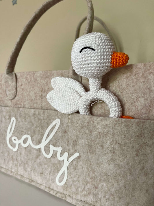 Poussin en peluche pour la poussée dentaire