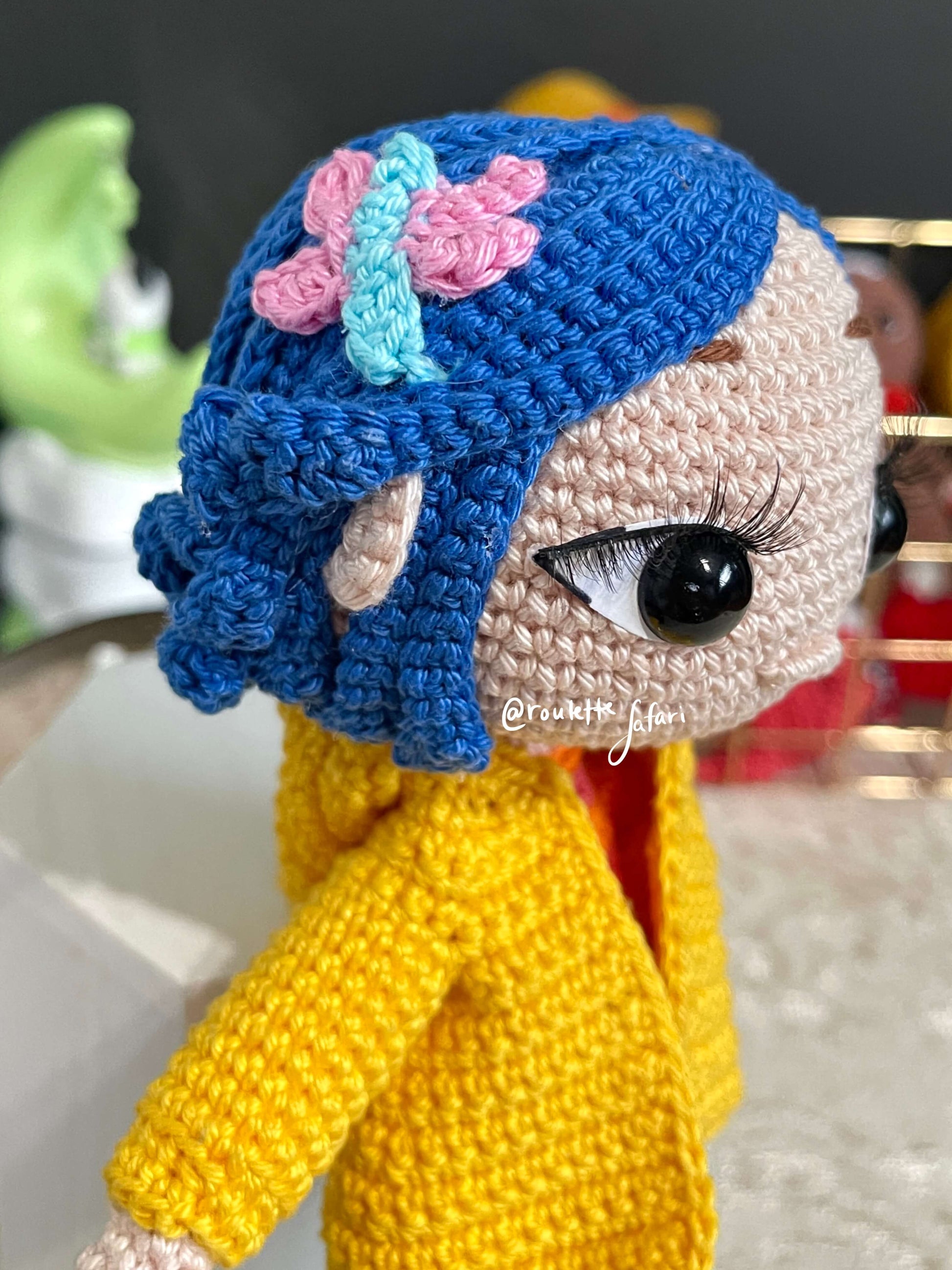 Crochet Amigurumi Coraline with a raincoat inspired Anime plush doll