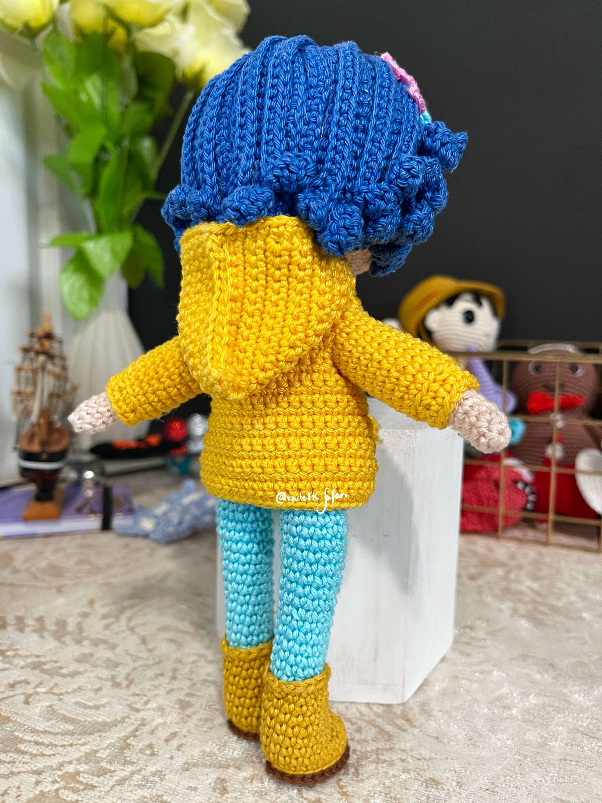 Crochet Amigurumi Coraline with a raincoat inspired Anime plush doll