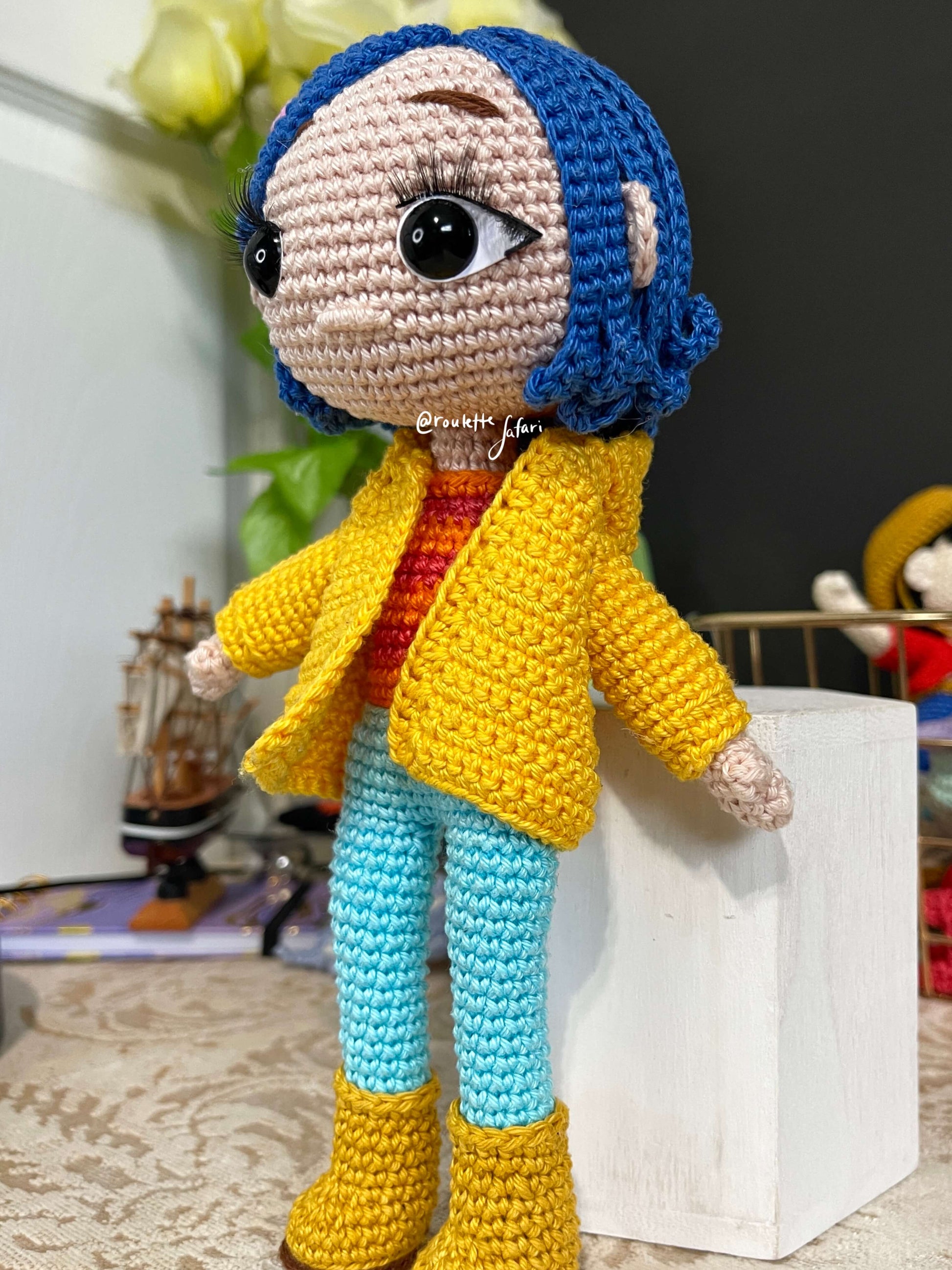 Crochet Amigurumi Coraline with a raincoat inspired Anime plush doll