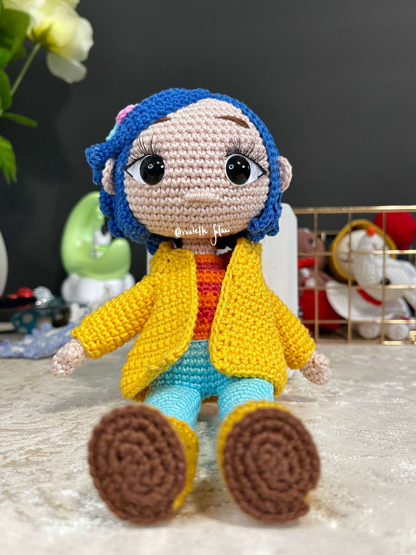 Crochet Amigurumi Coraline with a raincoat inspired Anime plush doll