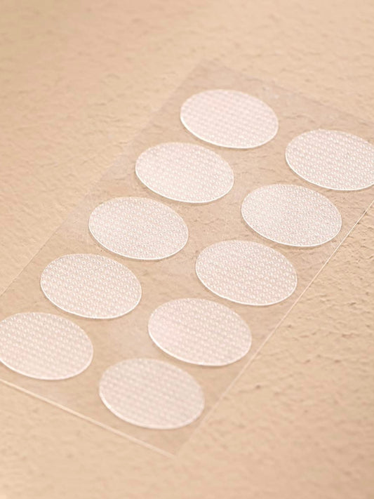 Earlobe support patch for pierced ears that eliminates the look of torn or stretched piercings and protects earlobes from tearing