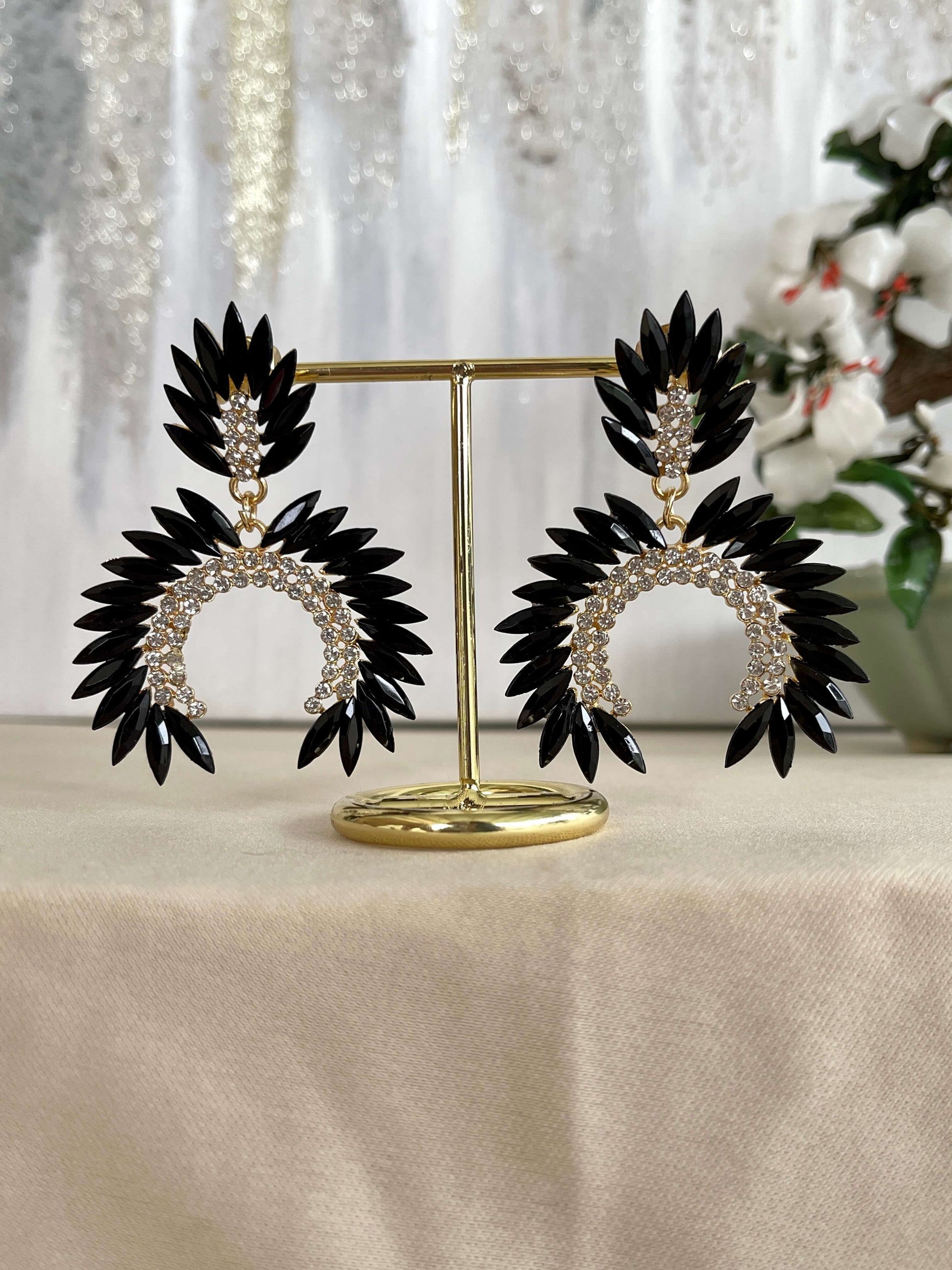 Black fancy geometric peacock feather shape dangle drop fashion jewelry earrings with rhinestones on stand - Roulette Safari