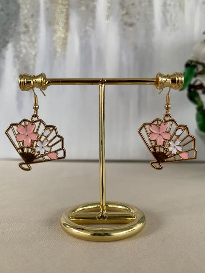 Asymmetric dangle drop fashion jewelry earrings, with a gold base traditional japanese fan charm and sakura flower on stand - Roulette Safari