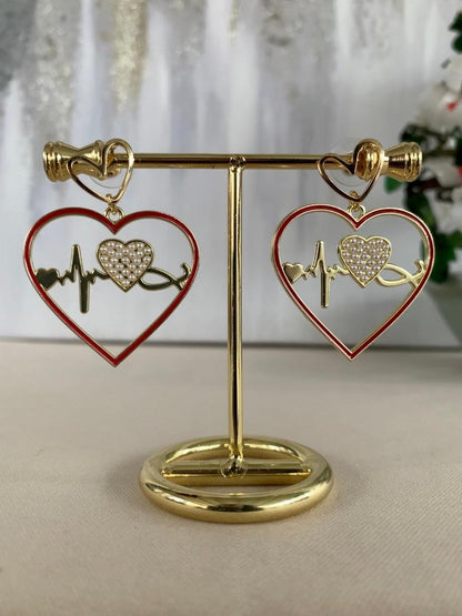 Red and gold ECG heartbeat asymmetric heart shape charm dangle drop fashion jewelry earrings on stand - Roulette Safari